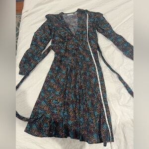 Doen Floral Dress. Tie back and hemmed.